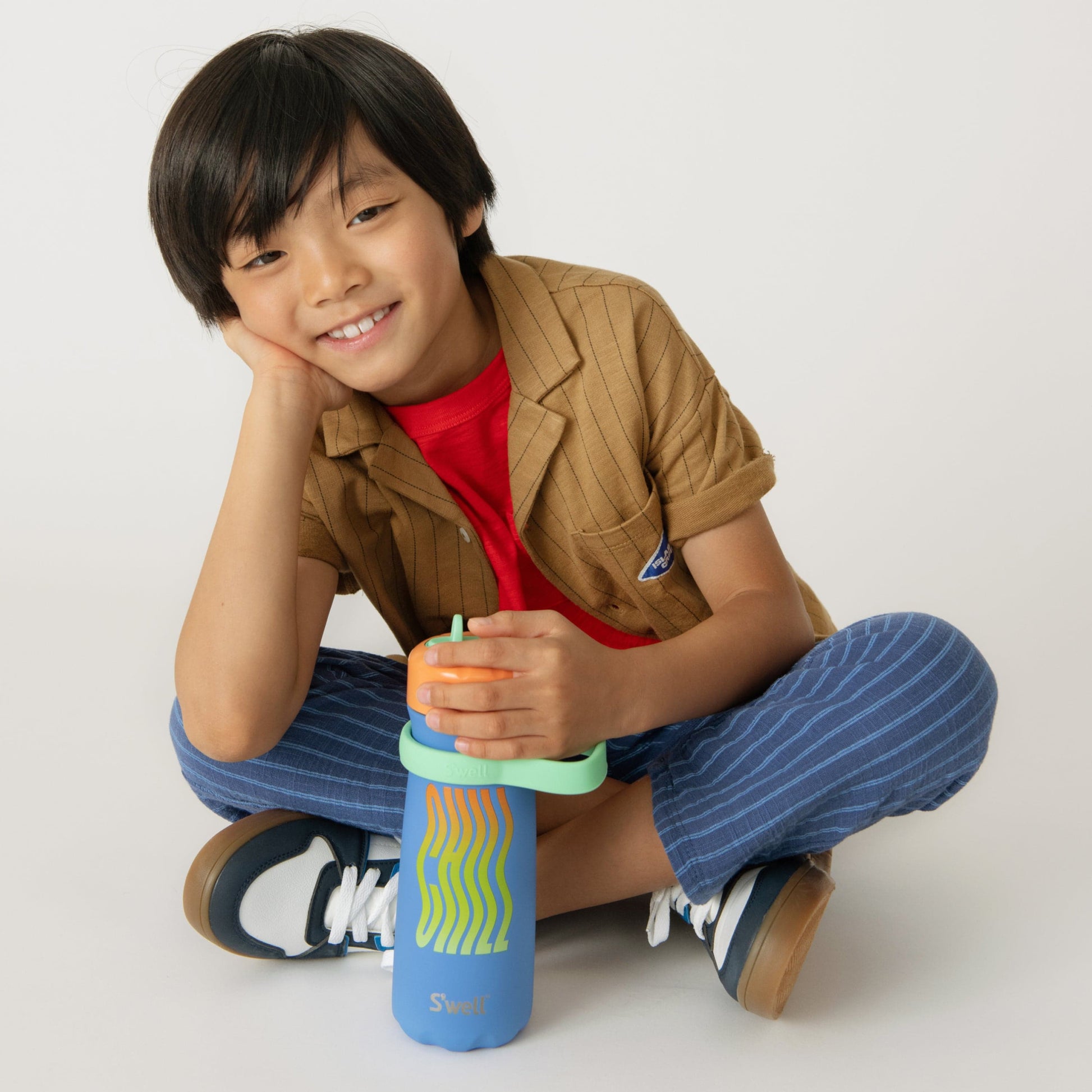 traveler-with-flip-straw-lid-16oz-m3 Swell-Kids-Water-Bottle-Traveler-16oz-Blue-Chill-Lifestyle.jpg