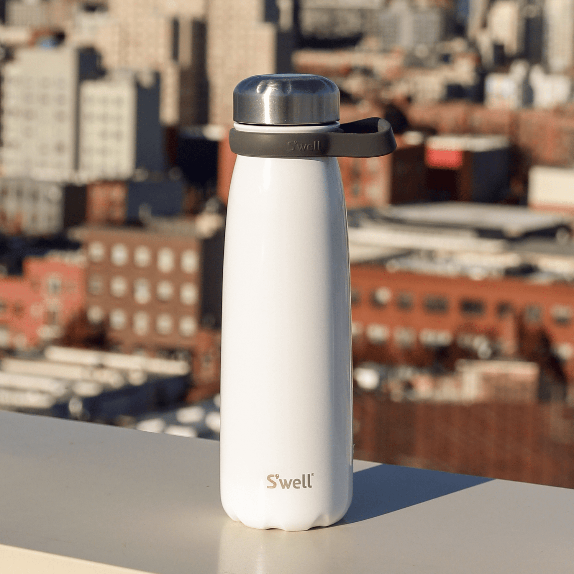 traveler-40oz-a0 Swell-Water-Bottle-Traveler-40oz-White-Angel-Food-Lifestyle.png